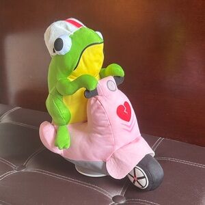 Adorable Green Frog Plush on Pink Scooter